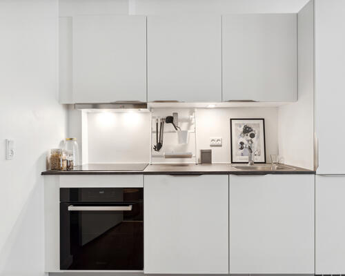 Stilrene lejligheder nær byens puls