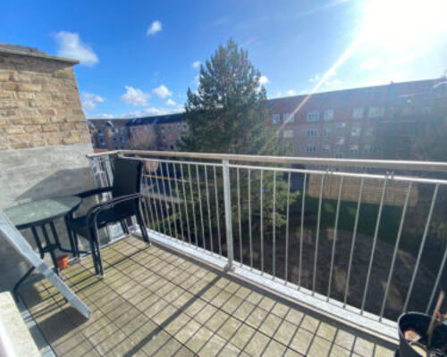 Dejlig og rummelig 2-værelses lejlighed i øgadekvarteret