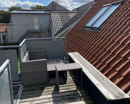 Velholdt centraltbeliggende lejlighed.