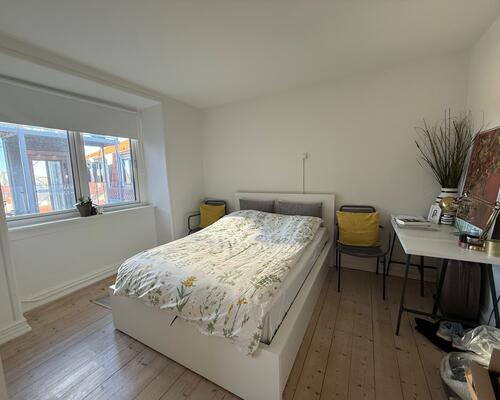 Charmerende 3 værelses med egen p. plads og elevator