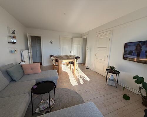 Charmerende 3 værelses med egen p. plads og elevator