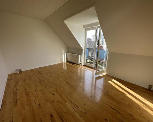 Indbydende lejlighed med altan i hjertet af Odense C