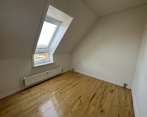 Indbydende lejlighed med altan i hjertet af Odense C