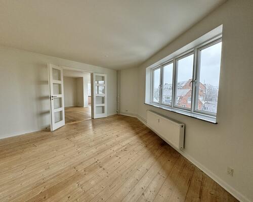 Lys og indbydende lejlighed nær Odense Å