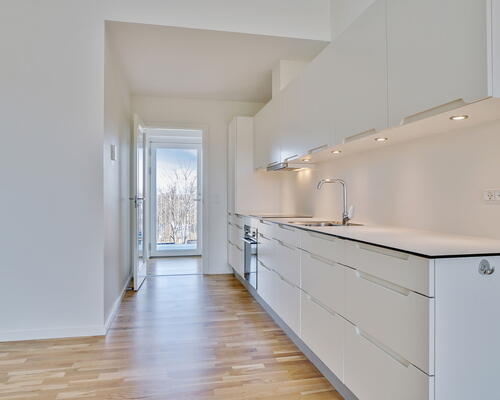 Bygården - Modern lejlighed i lækre materialer med plads til familien