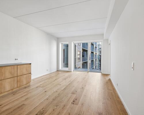 Nyopført lejlighed med altan og tre gode soveværelser