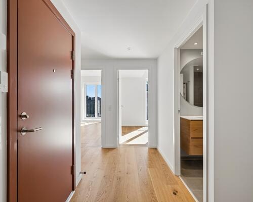 Nyopført lejlighed med altan og tre gode soveværelser