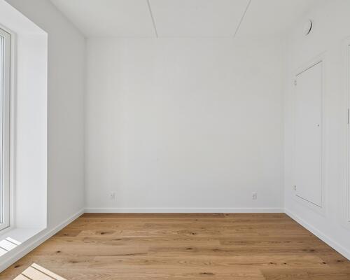 Nyopført lejlighed med altan og tre gode soveværelser