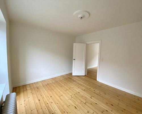 Indbydende 2-værelses lejlighed i centrum af Odense