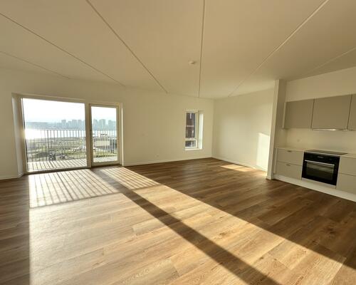 Skøn 3-værelses lejlighed med altan og udsigt