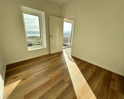 Skøn 3-værelses lejlighed med altan og udsigt