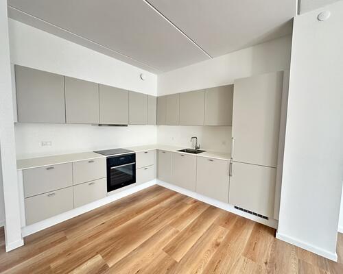 Delevenlig lejlighed med stor altan og udsigt over fjorden