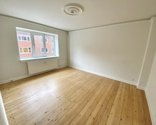 Indbydende 2-værelses lejlighed i centrum af Odense