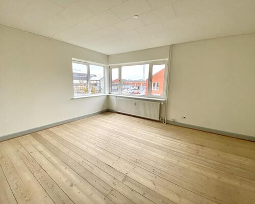 Indbydende 2-værelses lejlighed med skøn atmosfære