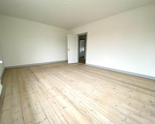 Indbydende 2-værelses lejlighed med skøn atmosfære