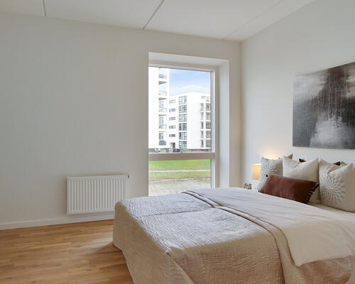 Flot 4 værelses lejlighed med altan