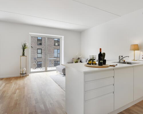 Stilfuld 2-værelses lejlighed med egen terrasse i smukke omgivelser i Ballerup - Jeres grønne åndehul midt i byen