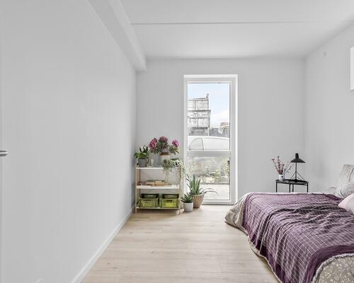 Lækker 2-vær. lejlighed i stueplan med egen terrasse i nyopført ejendom i Hasselager.