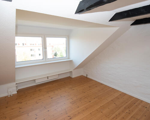 Skøn taglejlighed med charme og lys i Aalborg