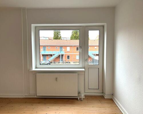 Charmerende og lys 2-vær. lejlighed i Skibhus – 71 Kvm