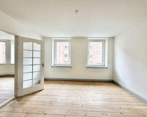 Indbydende 3 værelses lejlighed med central beliggenhed i Odense C