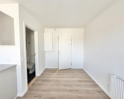 Moderne 1-værelses lejlighed med central beliggenhed