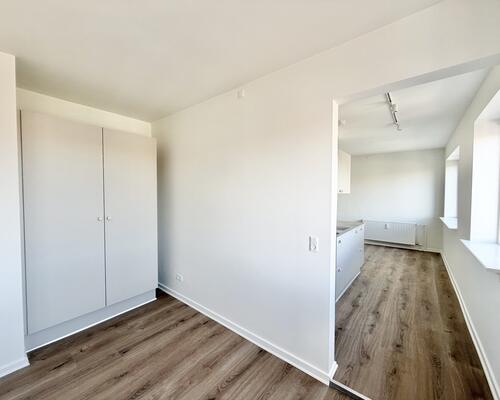 Moderne 1-værelses lejlighed med central beliggenhed