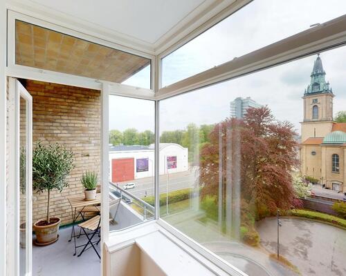 Indbydende lejlighed med altan i hjertet af Aalborg