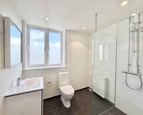 Moderne 1-værelses lejlighed med central beliggenhed