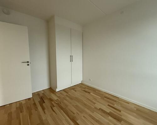 Delevenlig 2-værelses lejlighed med egen altan.