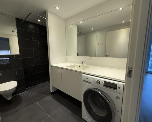 Delevenlig 2-værelses lejlighed med egen altan.