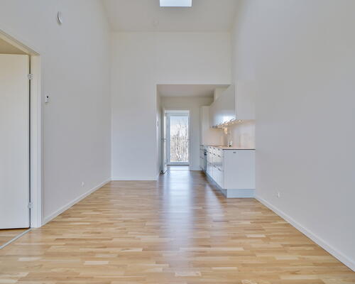 Bygården - Modern lejlighed i lækre materialer med plads til familien