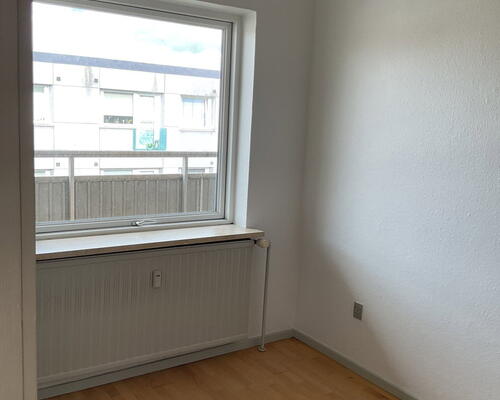 Lys 2-værelses på 46 m2 med grønt kig, parkering og ladestander