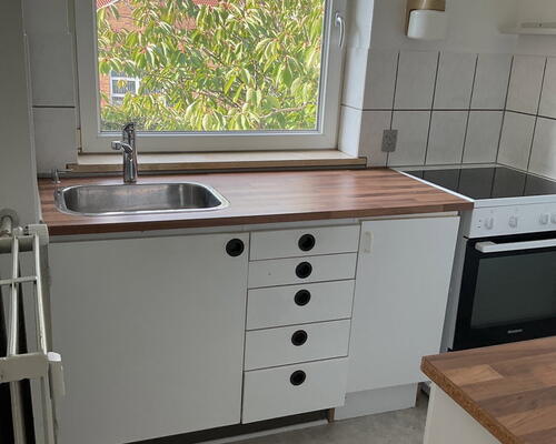 Lys 2-værelses på 46 m2 med grønt kig, parkering og ladestander