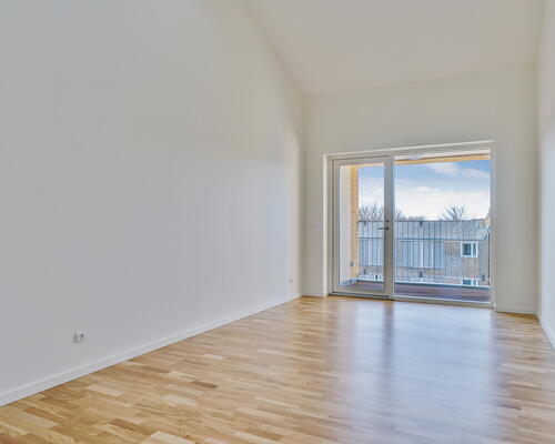 Bygården - Modern lejlighed i lækre materialer med plads til familien