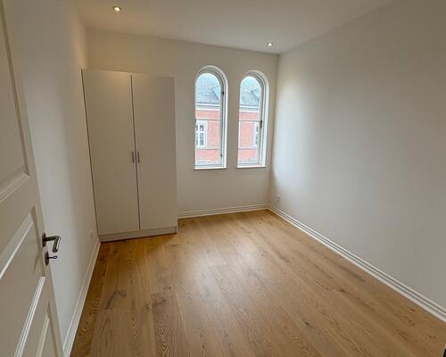 Charmerende 3. værelses lejlighed