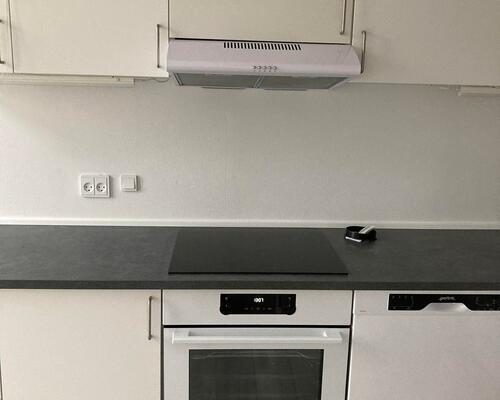 Skøn 1 værelses lejlighed med nyt køkken