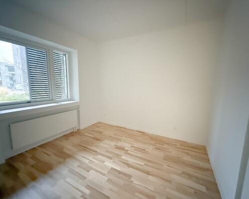 2-værelses lejlighed med egen altan og central beliggenhed