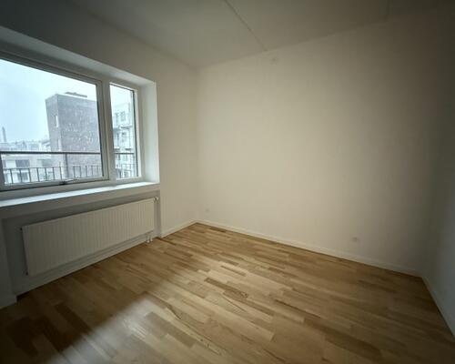 Delevenlig 2-værelses lejlighed med altan