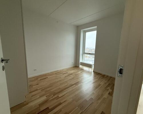 Delevenlig 2-værelses lejlighed med altan