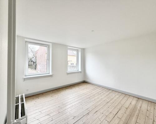 Indbydende 3 værelses lejlighed med central beliggenhed i Odense C