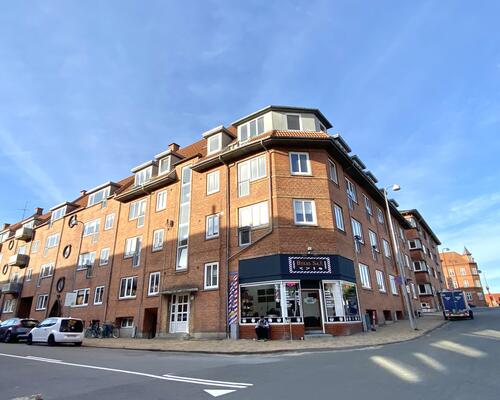 Lys og indbydende 2-værelses lejlighed i centrum