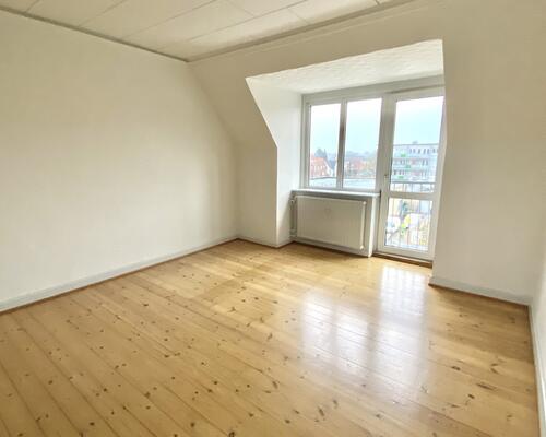 Lys og indbydende 2-værelses lejlighed i centrum