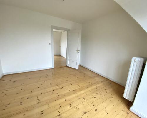 Lys og indbydende 2-værelses lejlighed i centrum