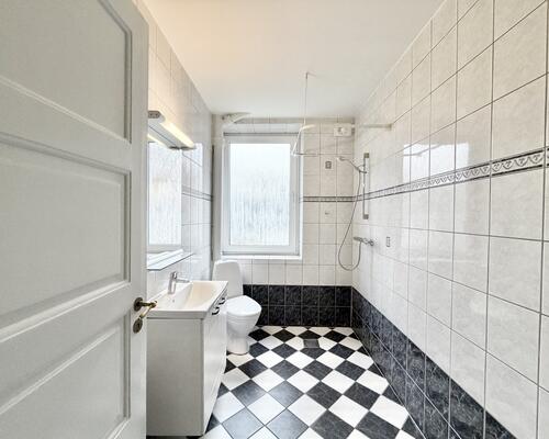 Indbydende 3 værelses lejlighed med central beliggenhed i Odense C