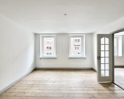 Indbydende 3 værelses lejlighed med central beliggenhed i Odense C