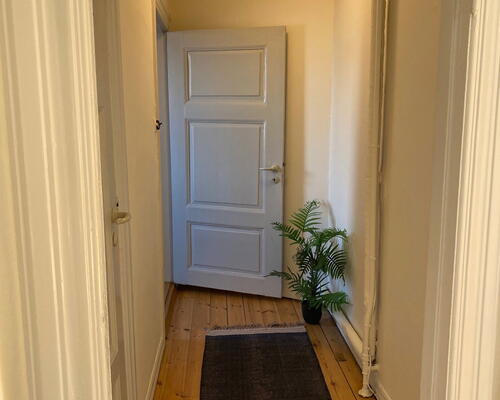 Delevenlig lejlighed tæt på indkøb, caféer og bylivet