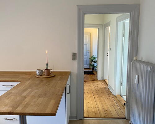 Delevenlig lejlighed tæt på indkøb, caféer og bylivet