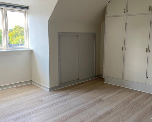 Delevenlig lejlighed tæt på indkøb, caféer og bylivet