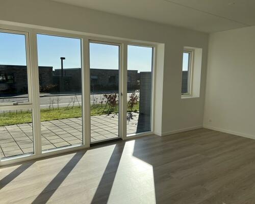 Moderne og velindrettet 2-plans rækkehus i attraktive Kildebjerg Ry